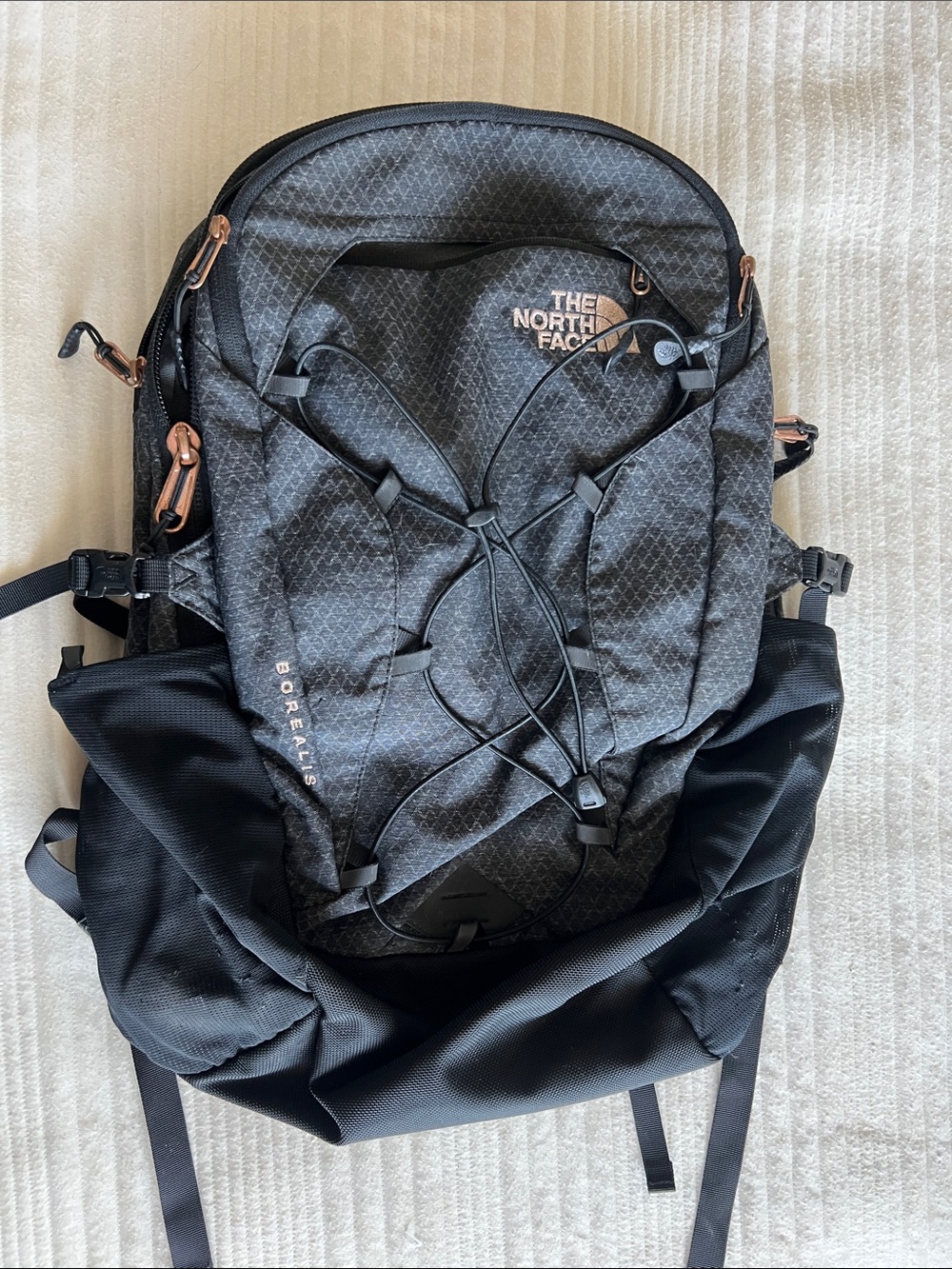 The North Face Borealis Backpack in Black with Copper Accents